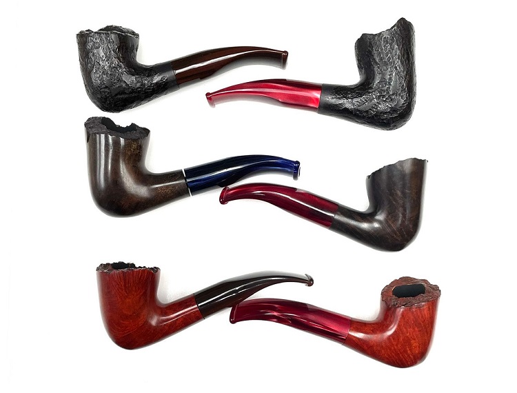 Briar wood tobacco pipes in assorted styles with rusticated finishes